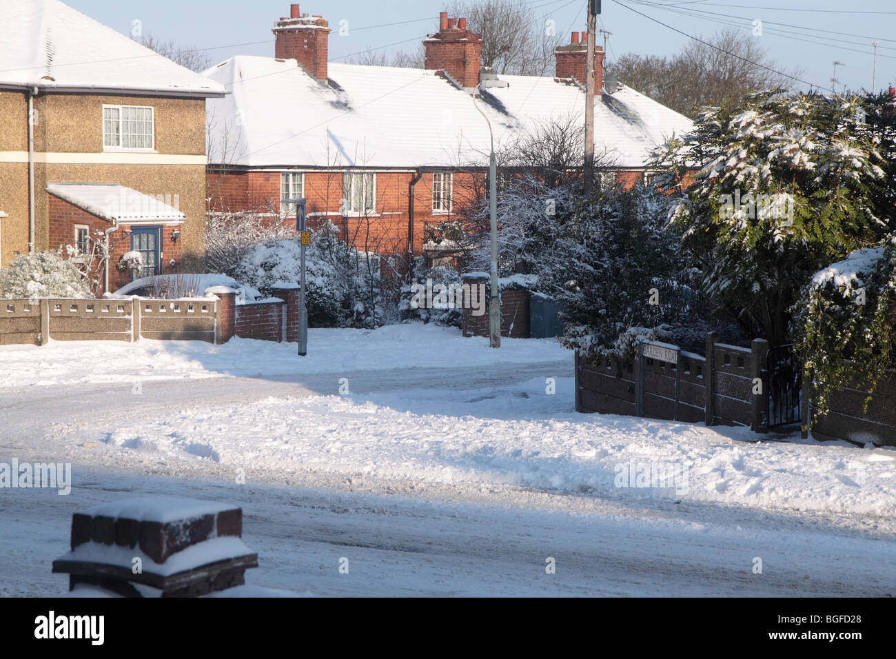 Snow covered suburban street in the UK Stock Photo