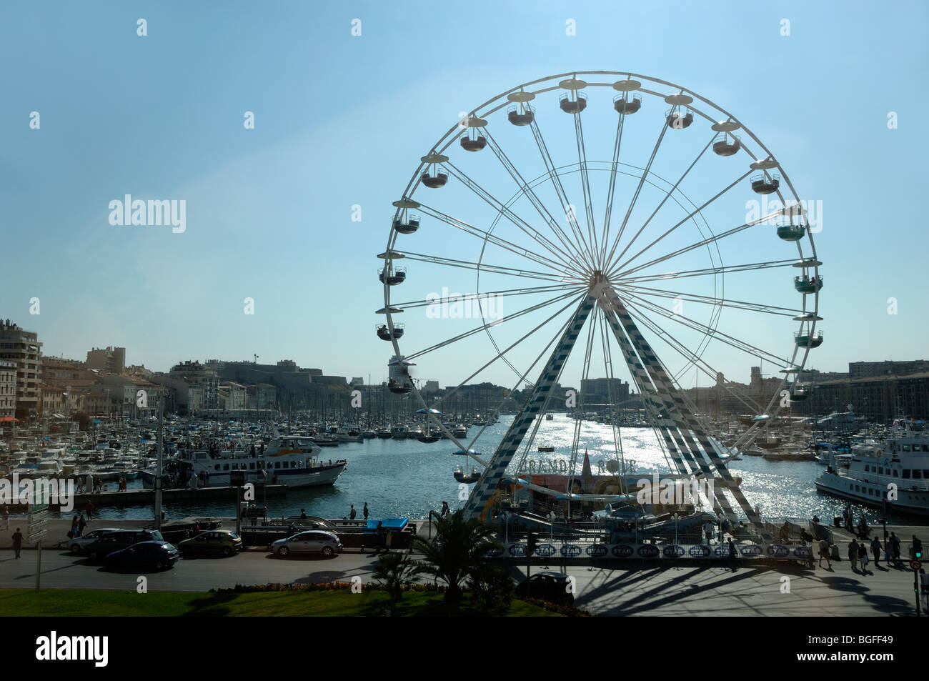 Silhouette of Ferris Wheel or Big Wheel on Quayside of the Old Port, Vieux Port, Harbour or Harbor, Marseille or Marseilles, Provence, France Stock Photo