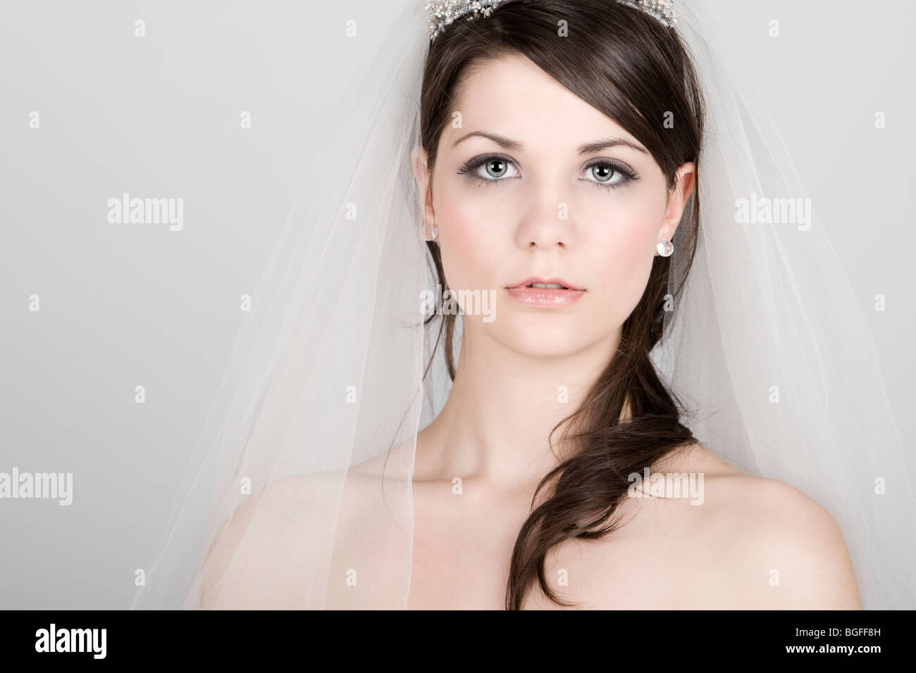 Striking Portrait Shot of a Beautiful Teenage Bride Stock Photo