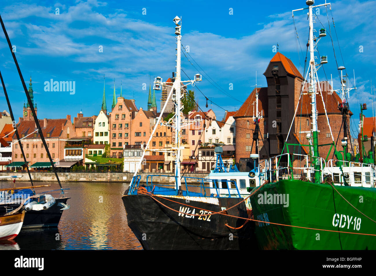 Old ships at marina in front of historic crane gate at old town of ...
