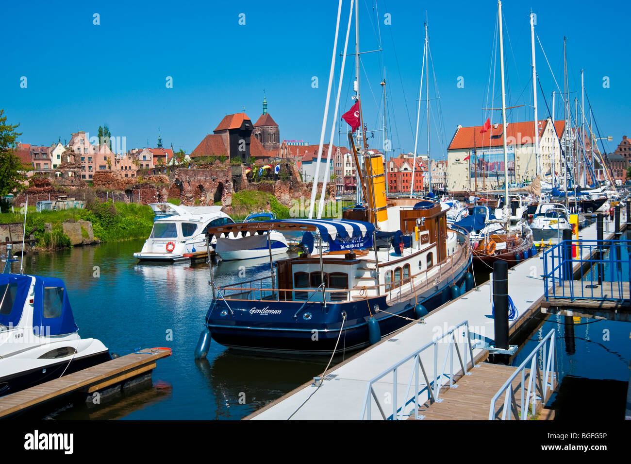 Yachts in marina of Gdansk, Poland fixed on floating stages at River