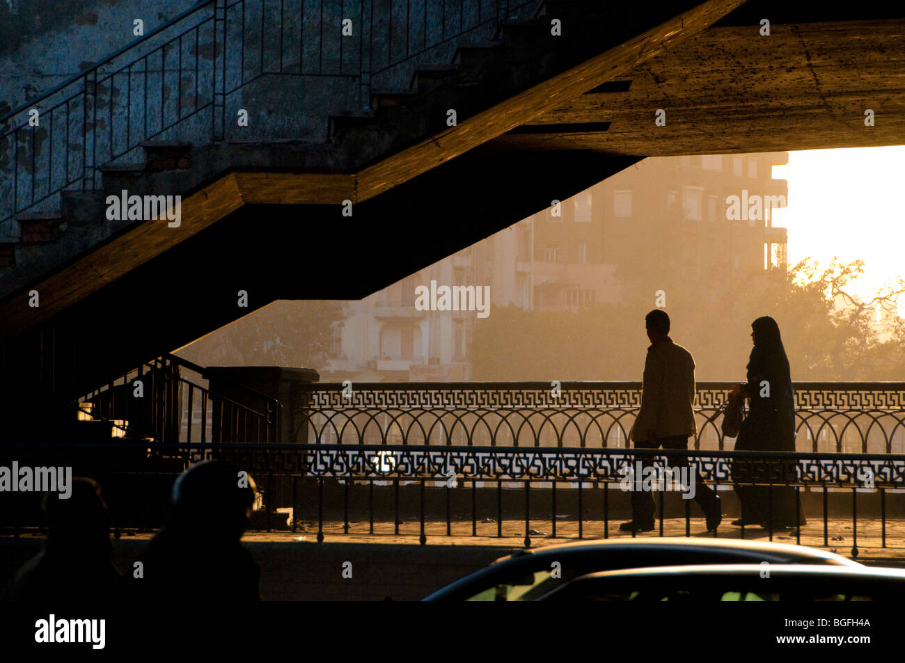 Couple walking through underpass in Cairo, Egypt, Africa Stock Photo