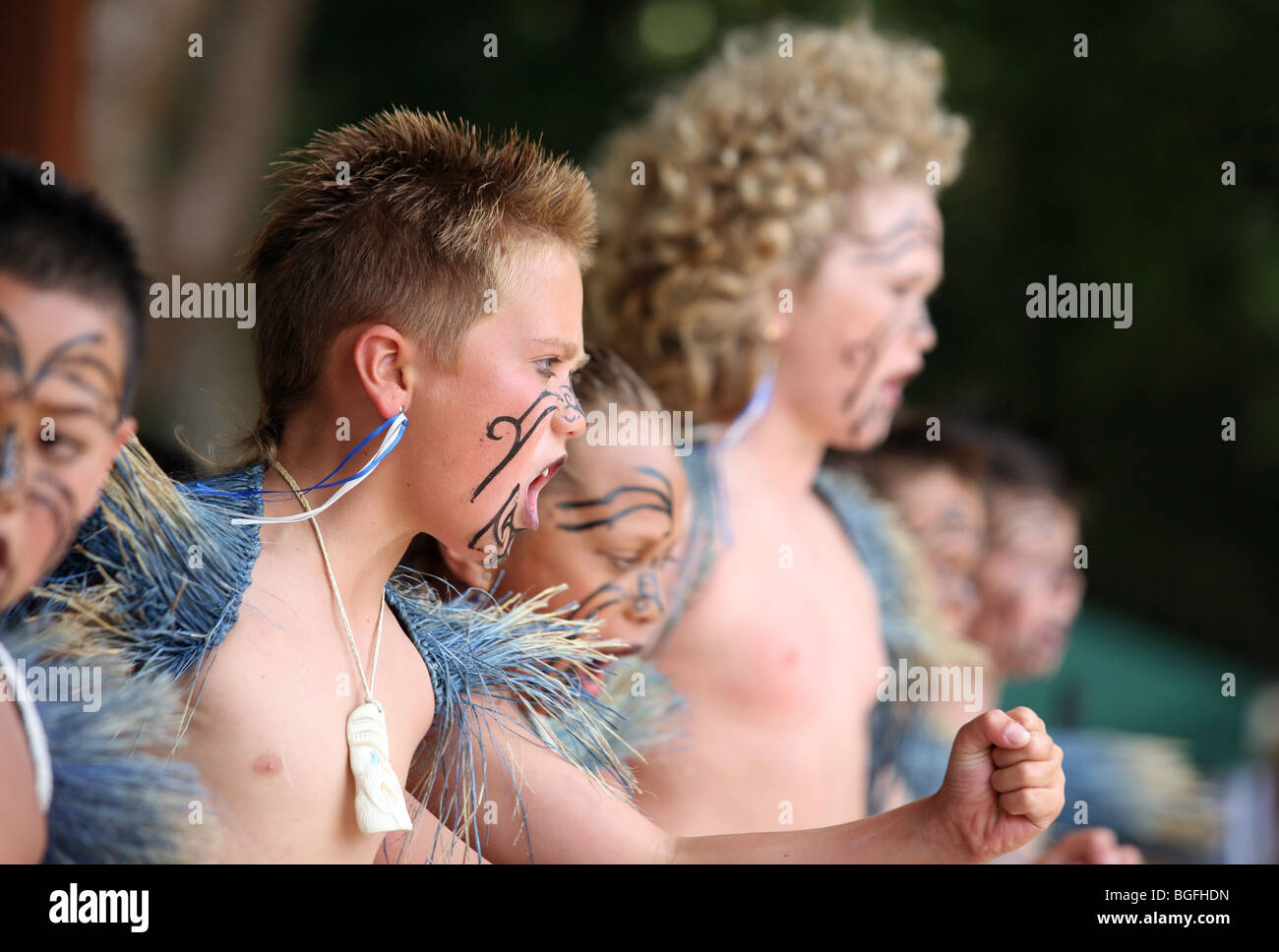 Male members of a Kapa Haka Roopu dancing at Waitangi Day celebrations on the Waitangi Treaty Grounds, Waitangi, New Zealand. Stock Photo