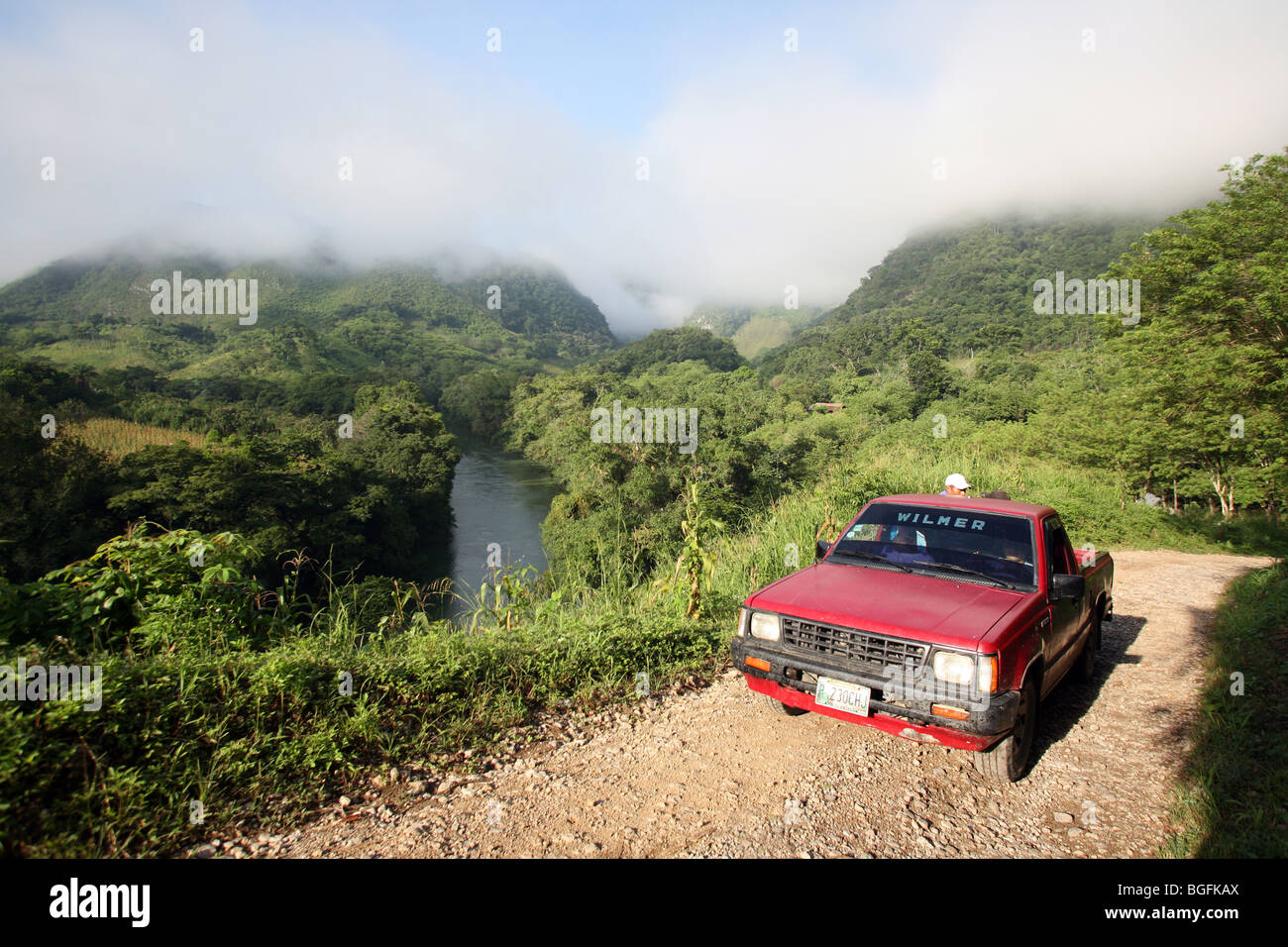 The steep road out of Semuc Champey with Rio Cahabon below Stock Photo