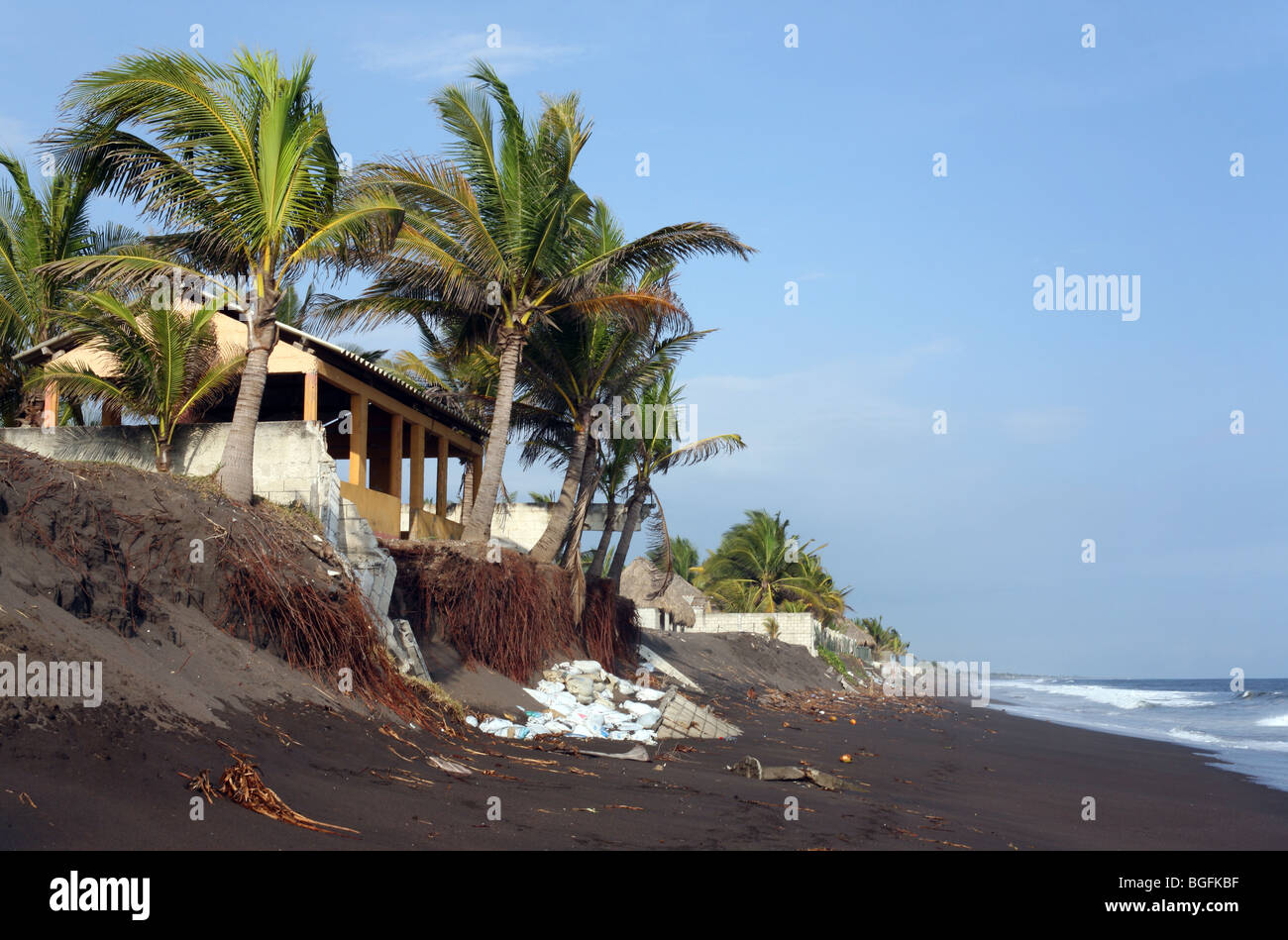 Coastal erosion in the area has claimed many beachfront properties. Monterrico, Guatemala, Central America Stock Photo
