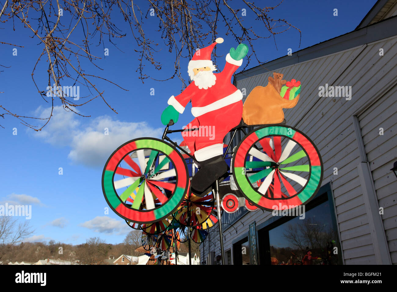 Santa Claus on bicycle lawn ornament, Port Jefferson, Long Island, NY Stock Photo