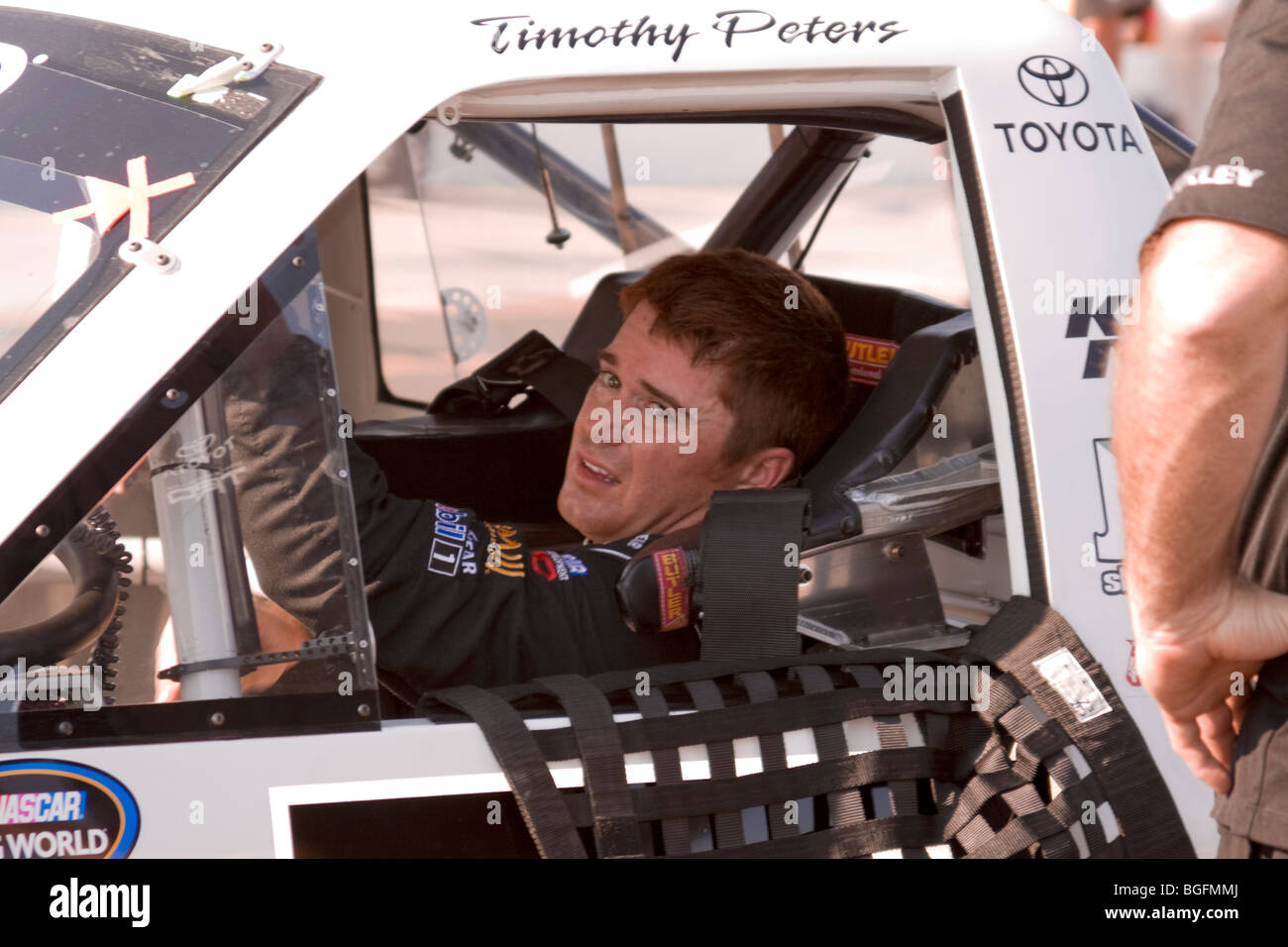 Timothy Peters relaxes in the cab of his truck after Qualifying 24th, for the Sept 26, 2009 Las Vegas 350 truck race. Stock Photo