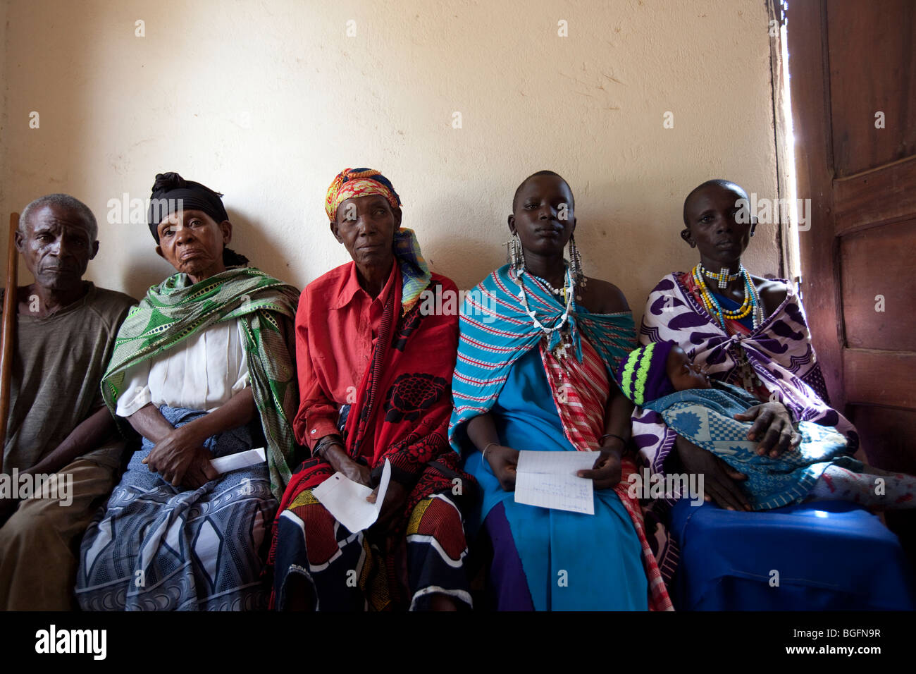 Villagers wait to be seen by a doctor in a clinic in Kilombero Village, Manyara Region, Tanzania. Stock Photo