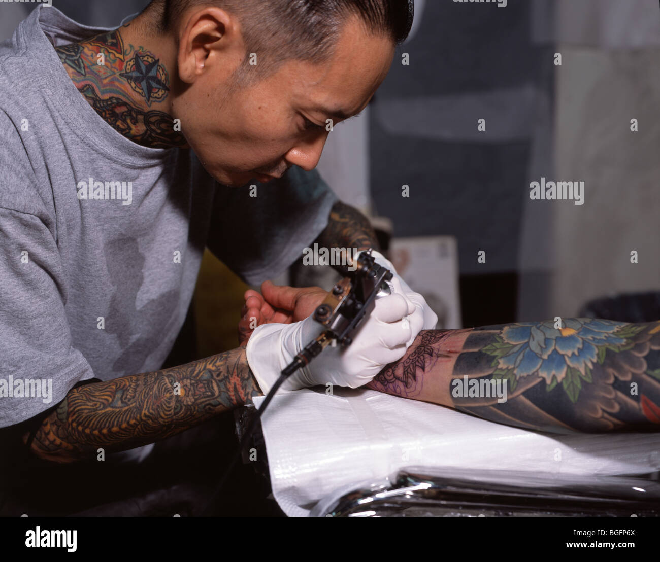 Tattoo arm hi-res stock photography and images - Alamy