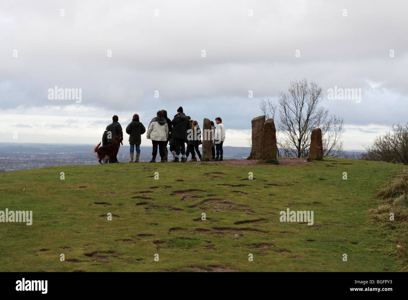 A family enjoying a walk on the Clent Hills, near Birmingham. Picture taken at The Four Stones standing stones Stock Photo