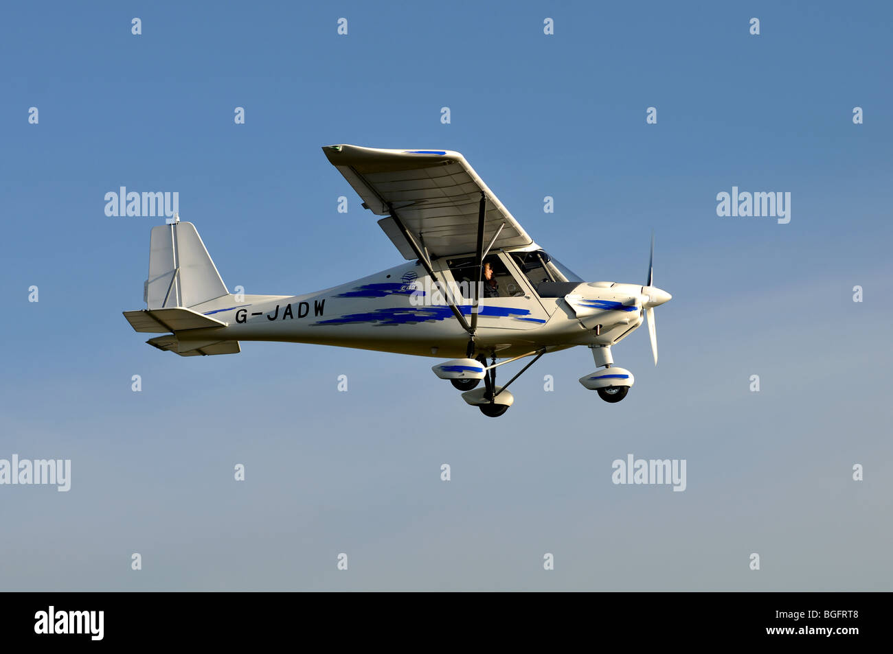 Ikarus C42 aircraft G-JADW approaching Wellesbourne Airfield, Warwickshire, UK Stock Photo