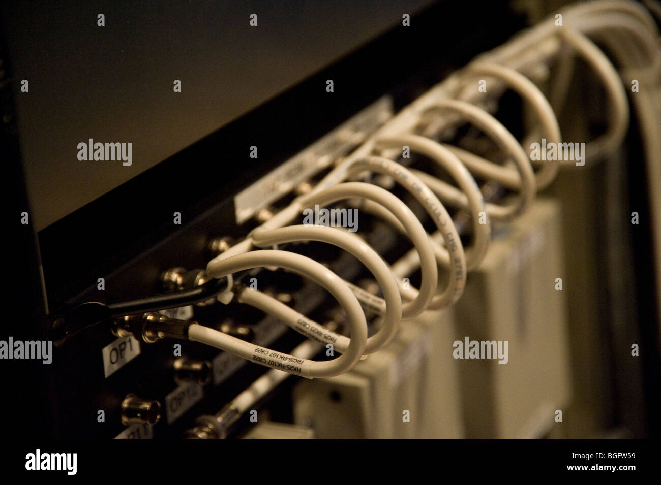 Multiple computer cables in back of console Stock Photo Alamy