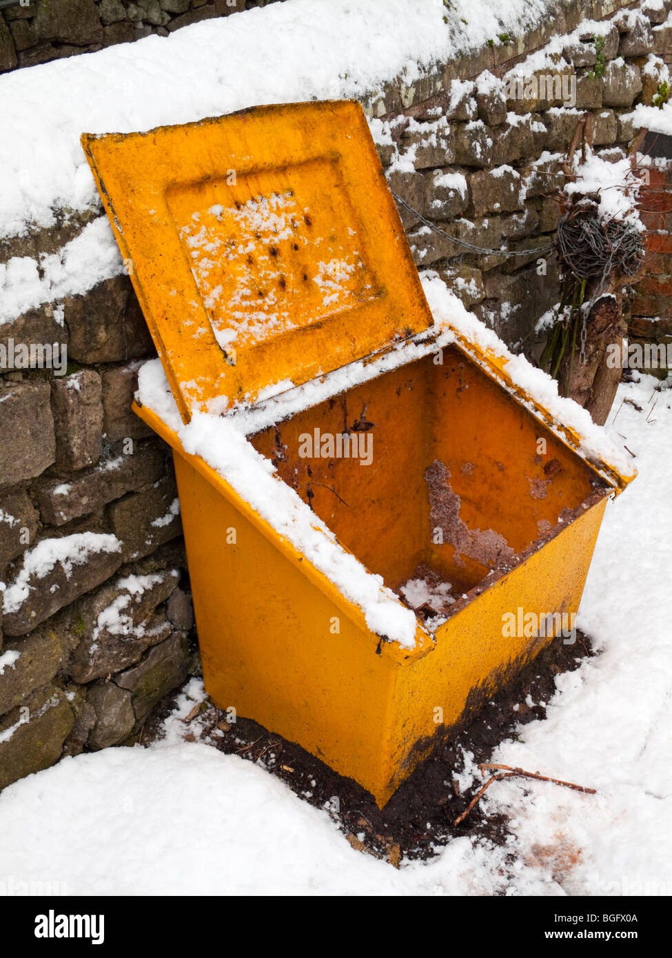 Empty grit bin used for gritting roads causing problems for motorists in Derbyshire during the harsh winter conditions of 2010 Stock Photo