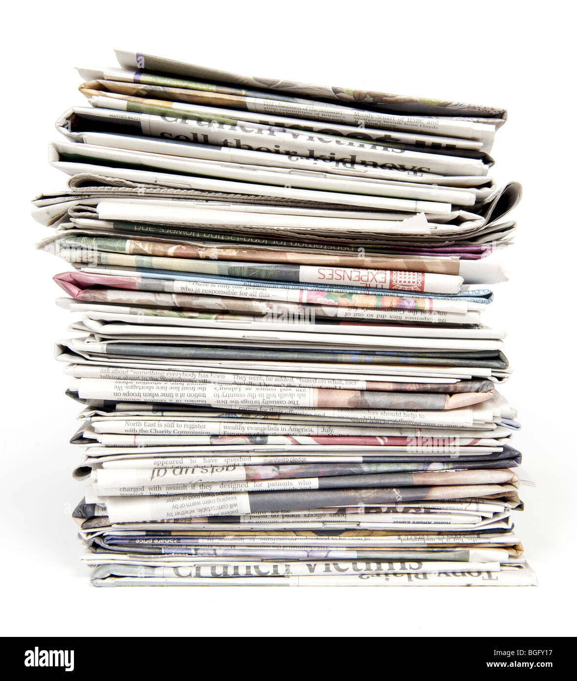 Stack of newspapers on a white background Stock Photo