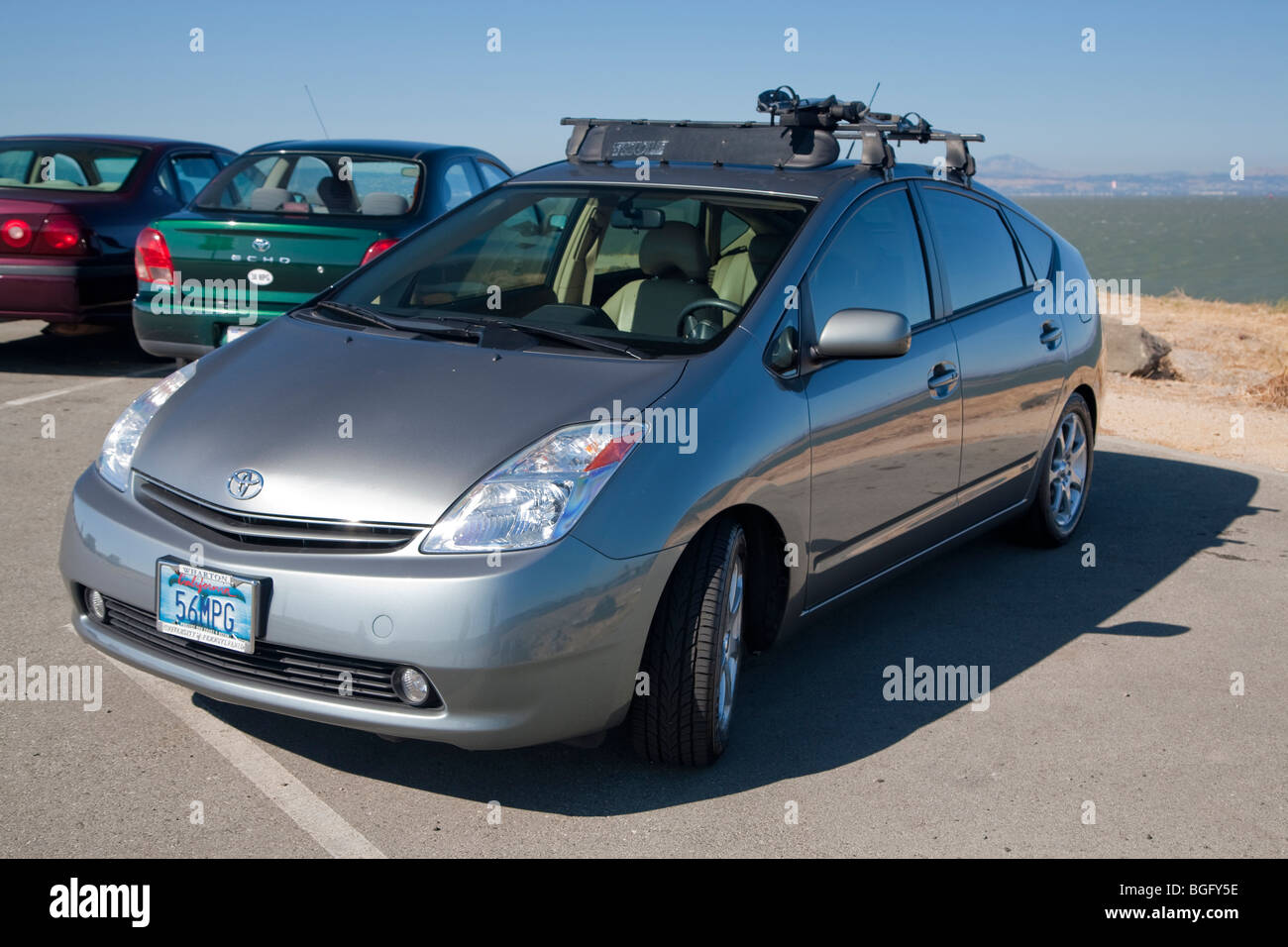 2004 Toyota Prius has a '56 MPG' custom license plate. People pay for customized plates and proceeds support various causes. Stock Photo