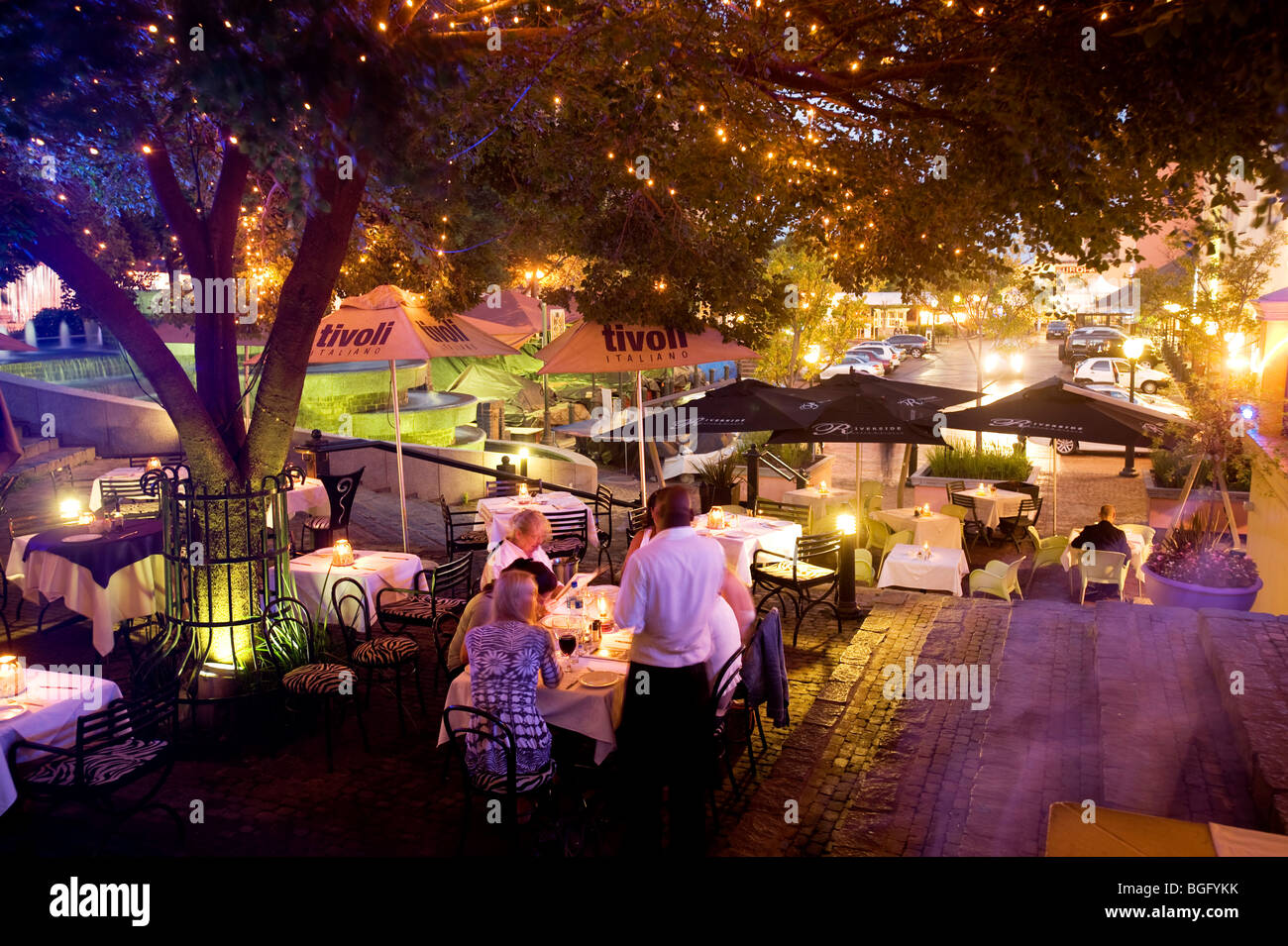 Outdoor cafe in the evening. Sandton, Johannesburg, South Africa Stock