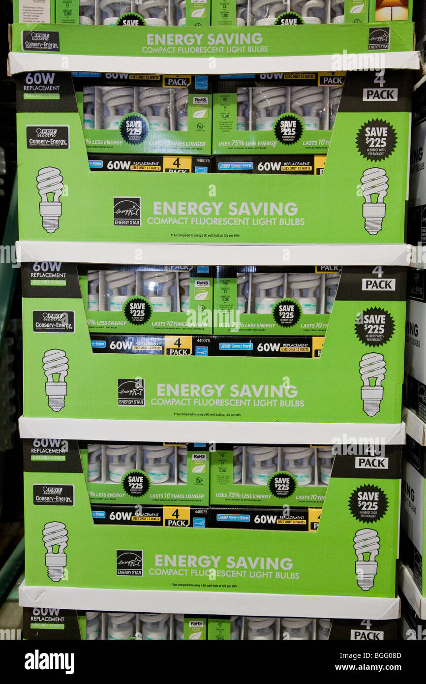 Close up of green packages of Feit Electric brand Energy Star rated compact fluorescent light bulbs (CFLs). Stock Photo