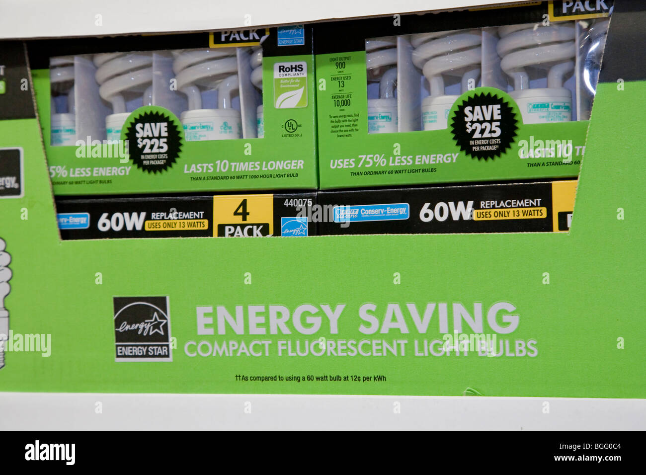 Close up of green packages of Feit Electric brand Energy Star rated compact fluorescent light bulbs (CFLs). Stock Photo
