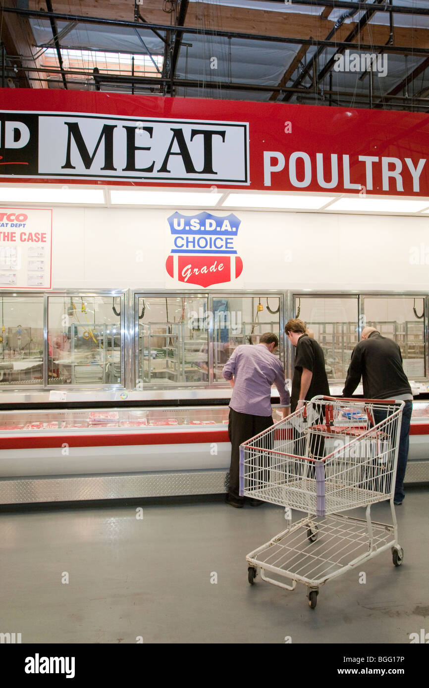 Customers shopping at meat and poultry section at Costco selling USDA Choice Grade Beef. Costco, California, USA Stock Photo