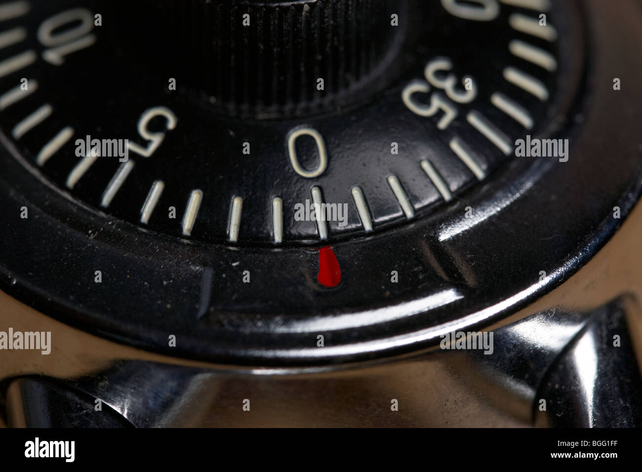 dusty combination padlock showing the 0 dial number Stock Photo