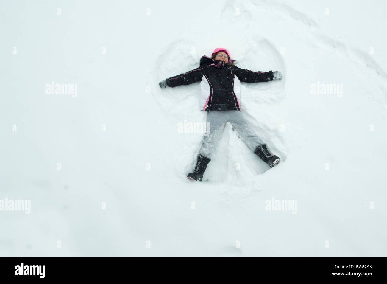 Making a Snow Angel Stock Photo Alamy