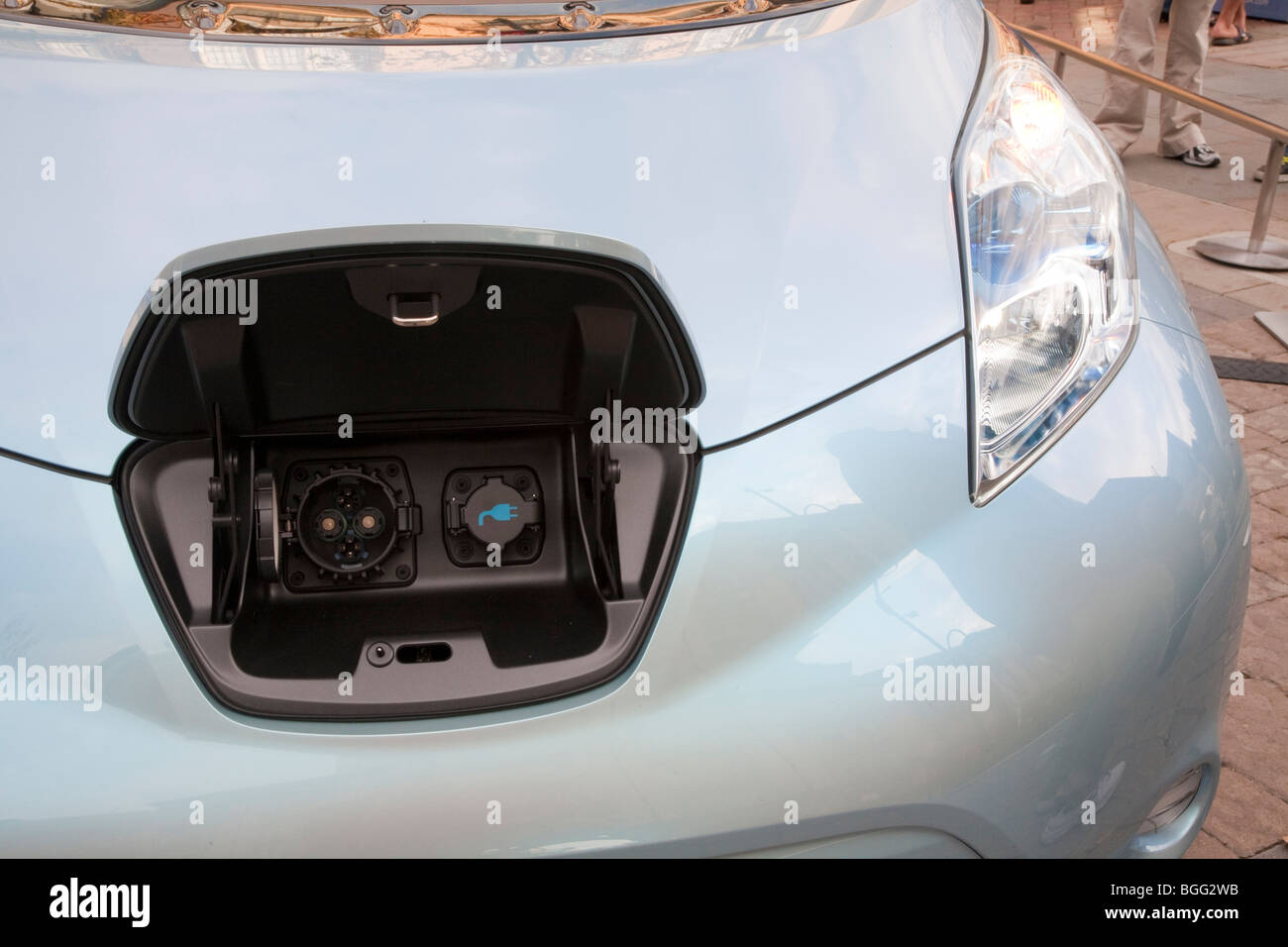 Close up of electric charging plugs compartment, in lieu of a gas tank