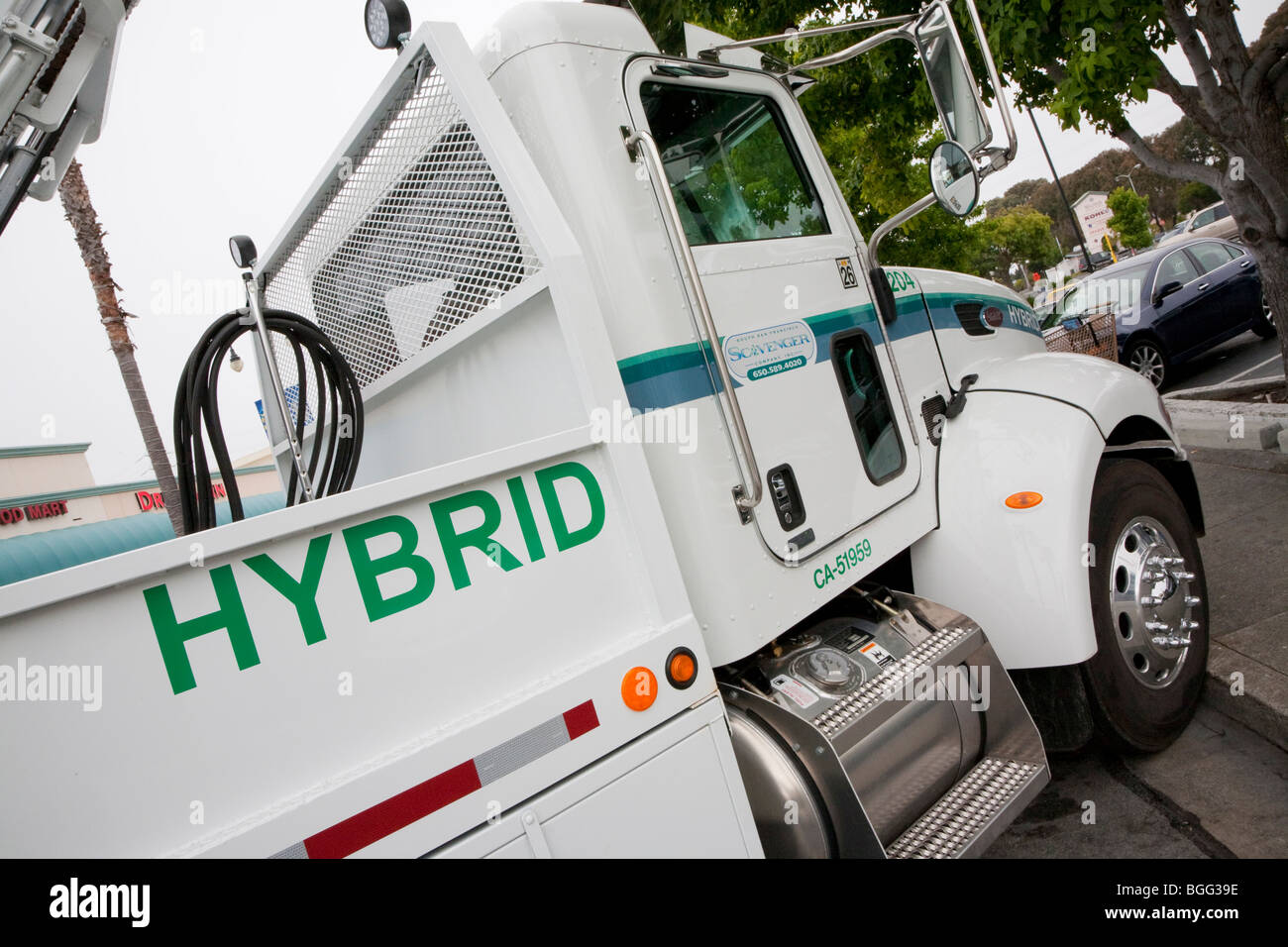 Tilted view of a Peterbilt Hybrid Electric (HE) Truck Model 330 Class 6 vehicle. California, USA Stock Photo