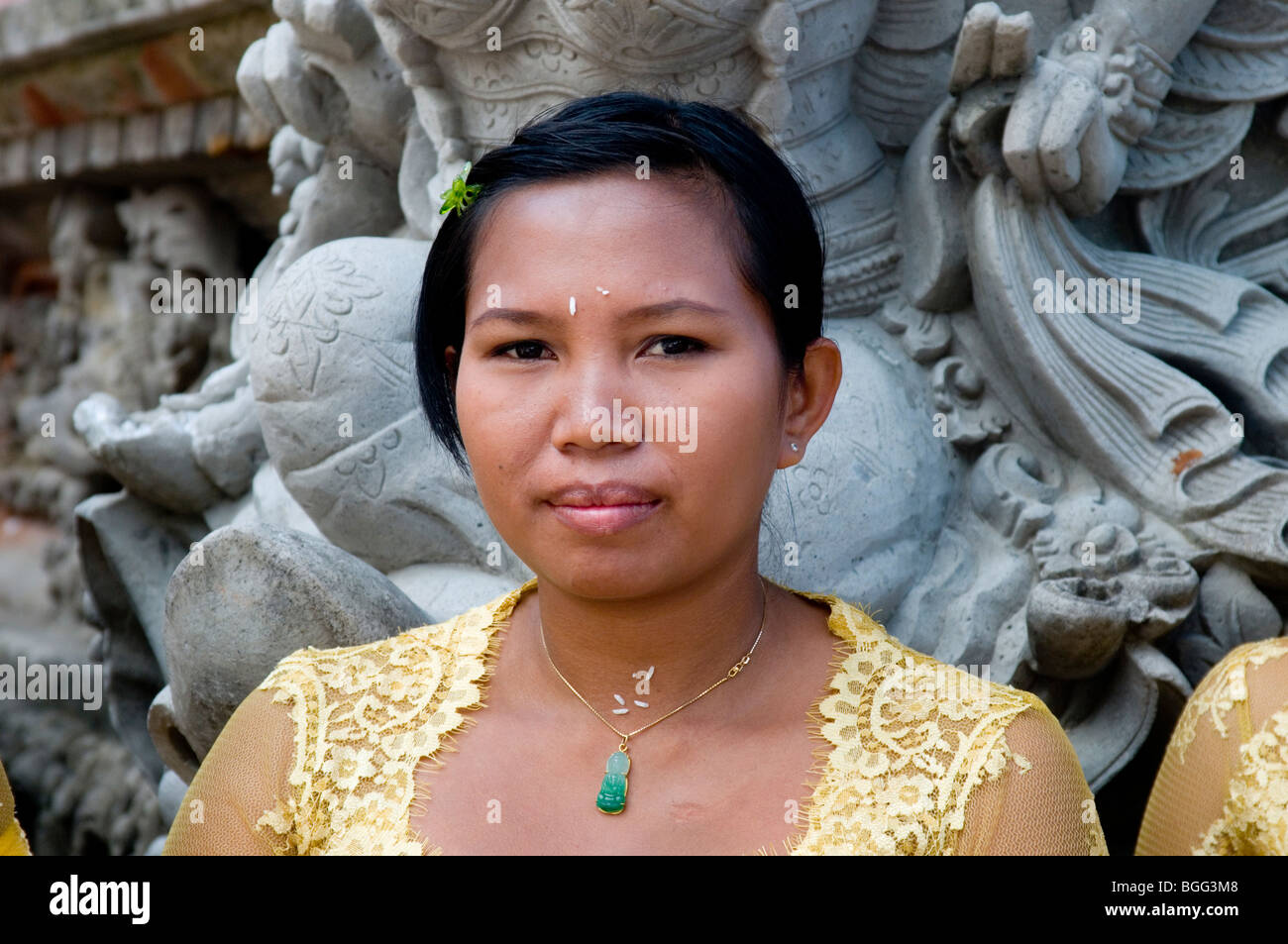 Woman at a temple festival in Benyutung, outside Ubud, the Balinese location for the movie 'Eat, Pray, Love'. Stock Photo