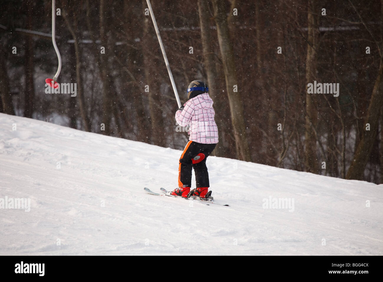 Little girl learning alpine skiing Stock Photo Alamy