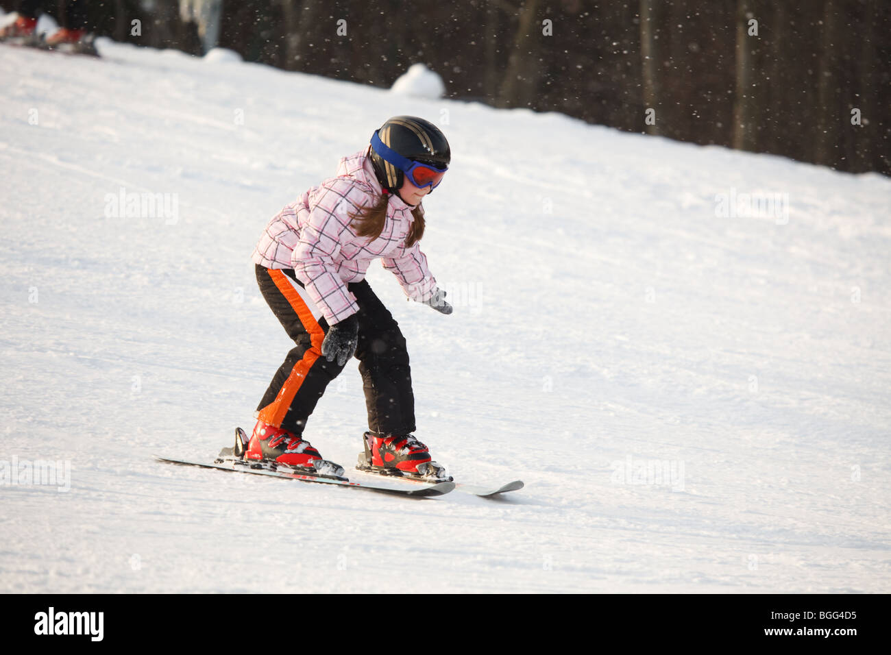 Little girl learning alpine skiing Stock Photo Alamy