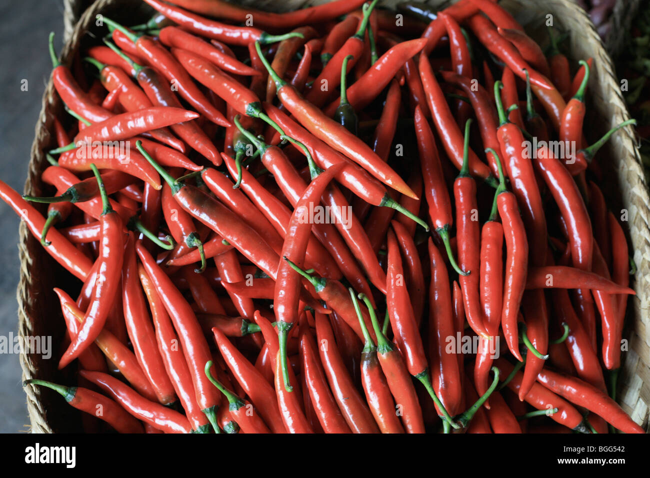 Basket of red chili peppers Stock Photo Alamy