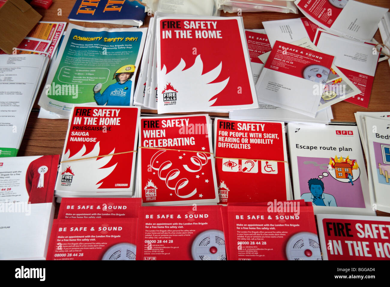 A table of Fire Safety leaflets on display at a London Fire Brigade fire safety awareness day, London UK. Dec 2009 Stock Photo