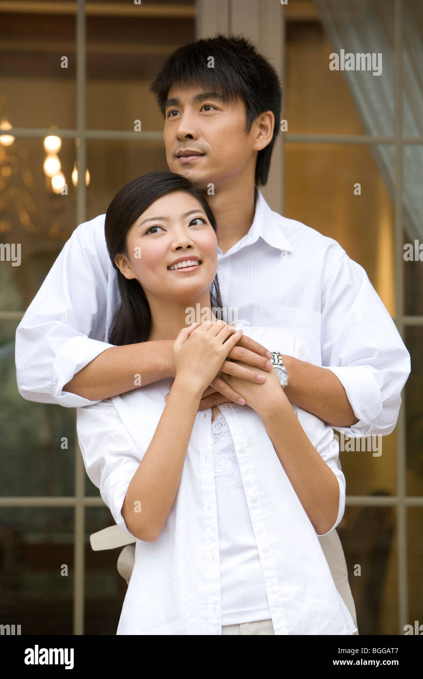 Portrait of young couple Stock Photo - Alamy