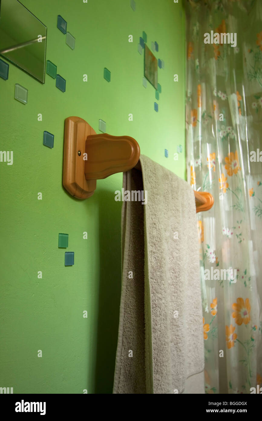 Wooden towelrail in bright green bathroom. color Stock Photo Alamy