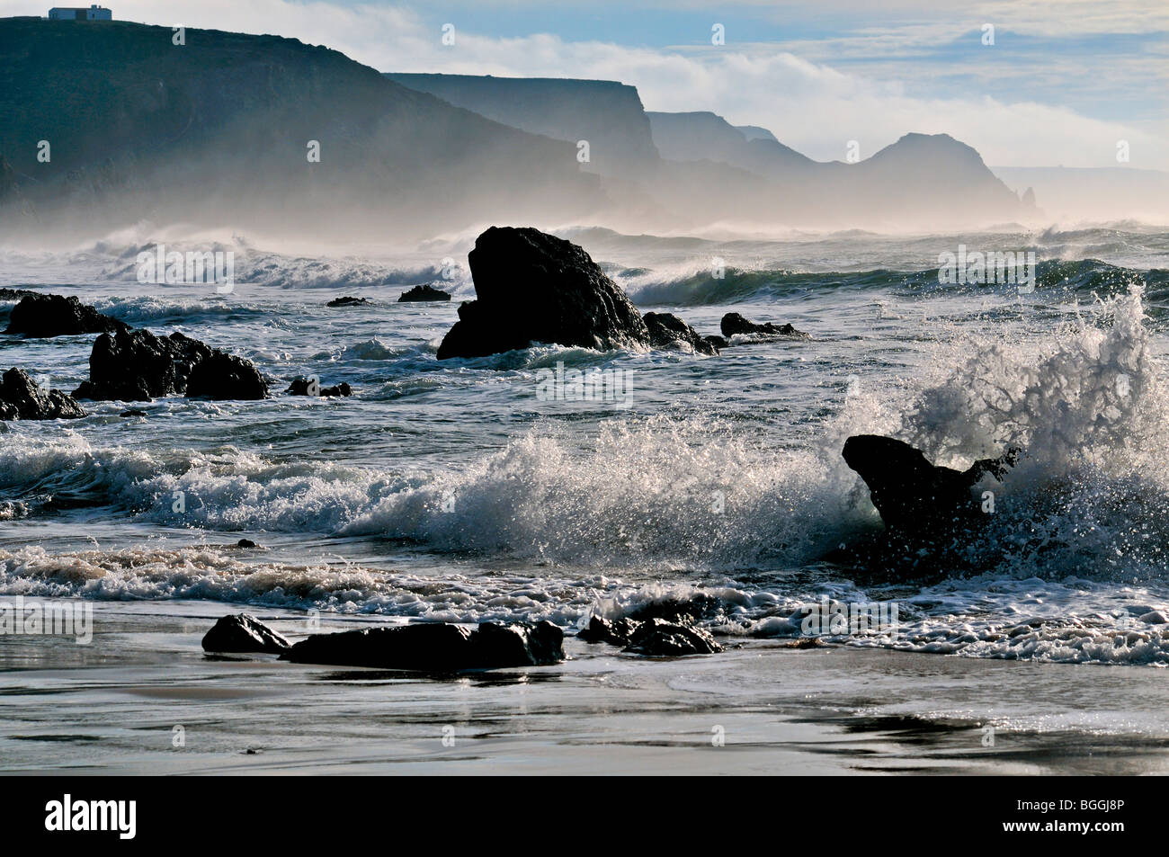 Portugal, Algarve: Waves and rocks at the Beach Praia do Amado Stock Photo