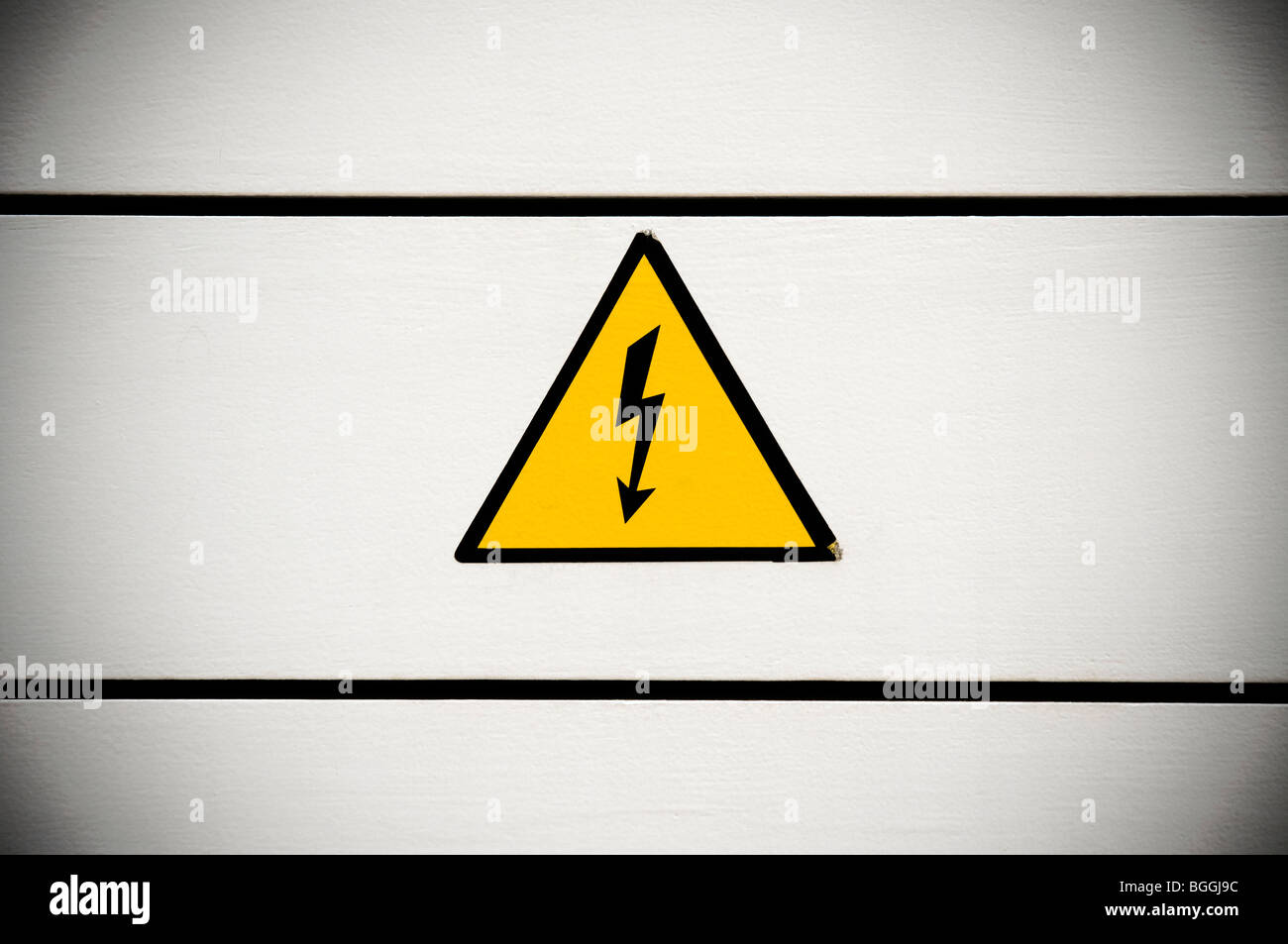 Warning sign with electricity lightning bolt Stock Photo Alamy