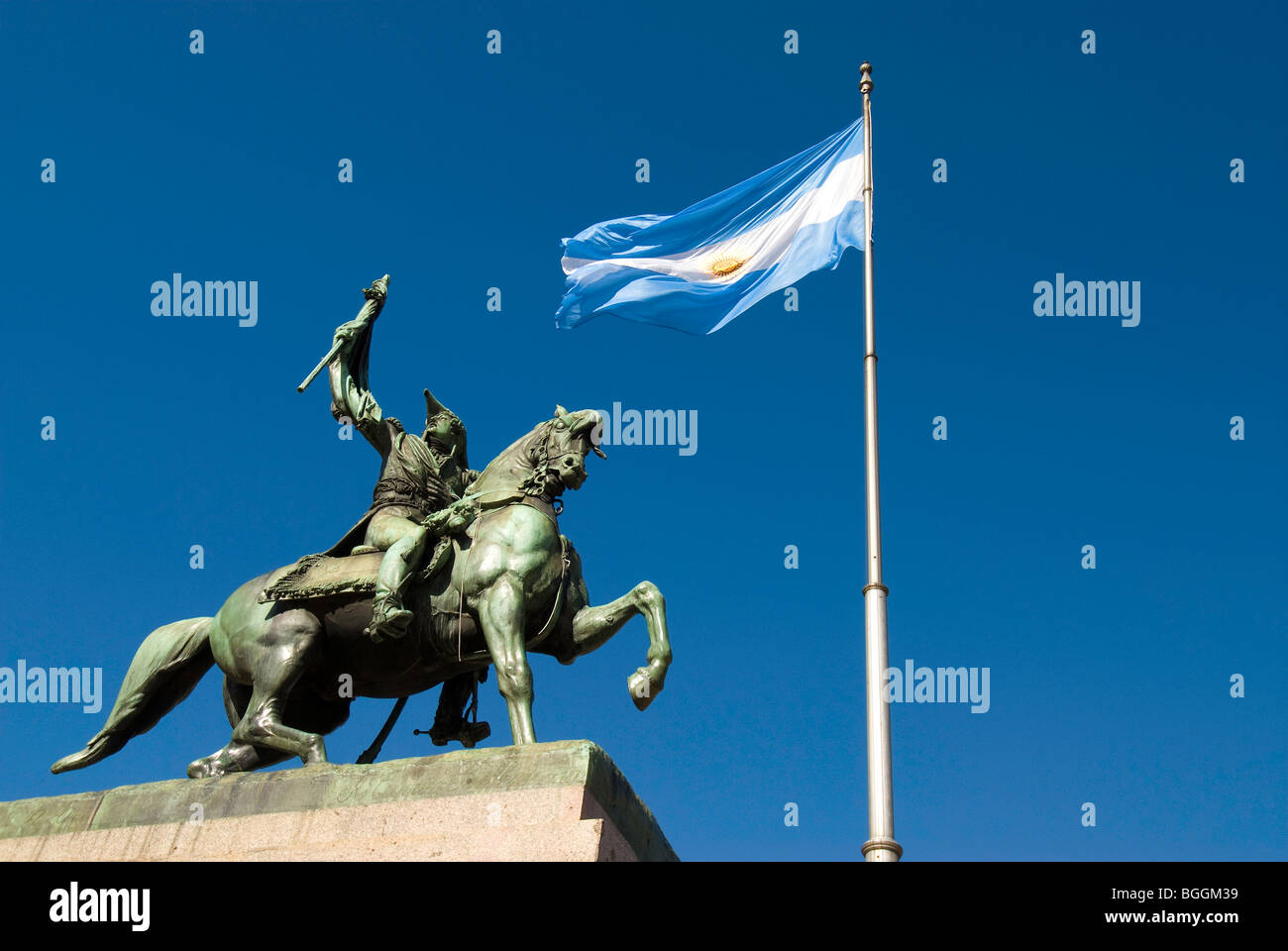 Statue of General Manuel Belgrano on his horse with the flag in ...