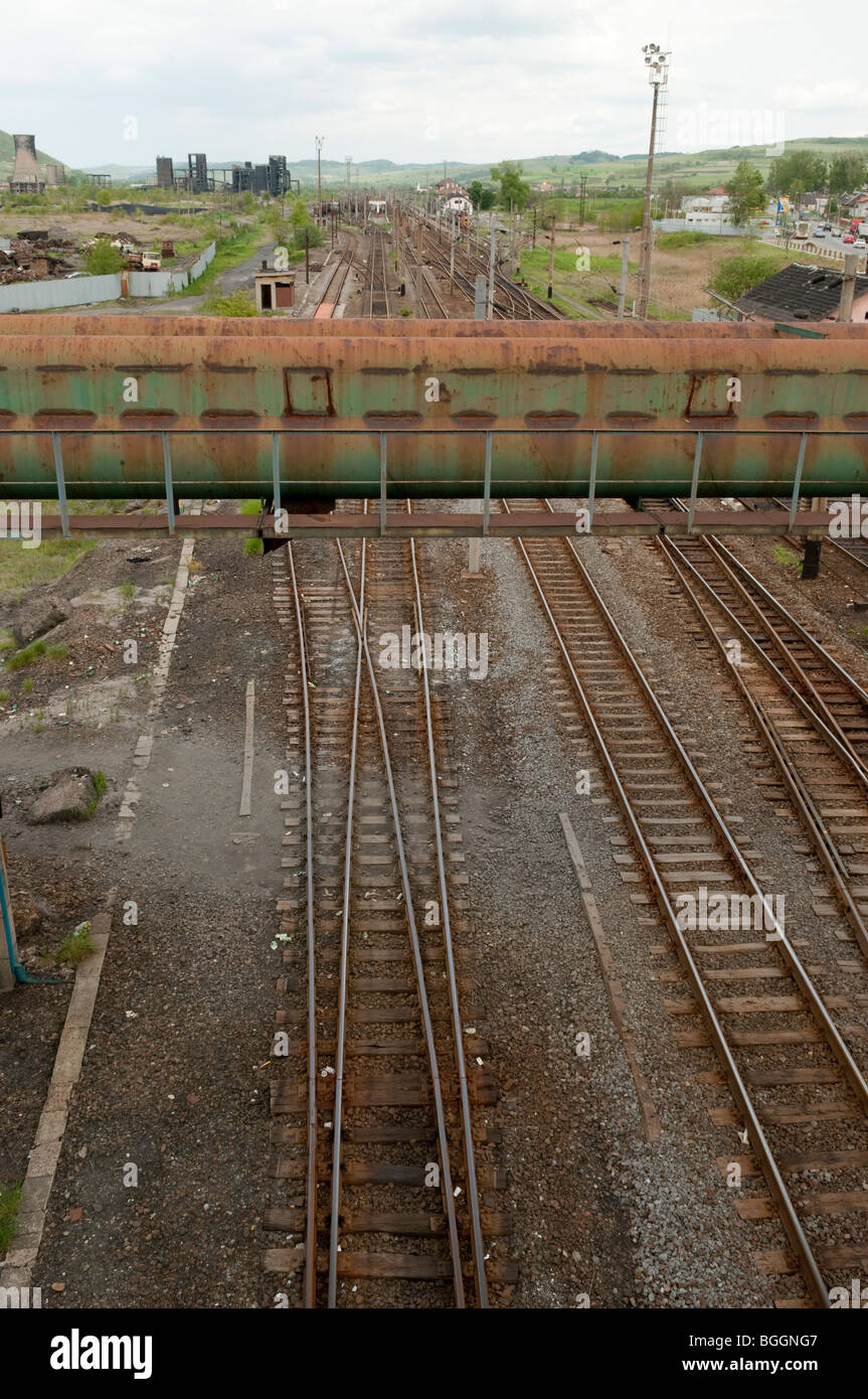 Rail tracks near the disused Carbosin Factory causing pollution in Copsa Mica Romania Eastern Europe Stock Photo