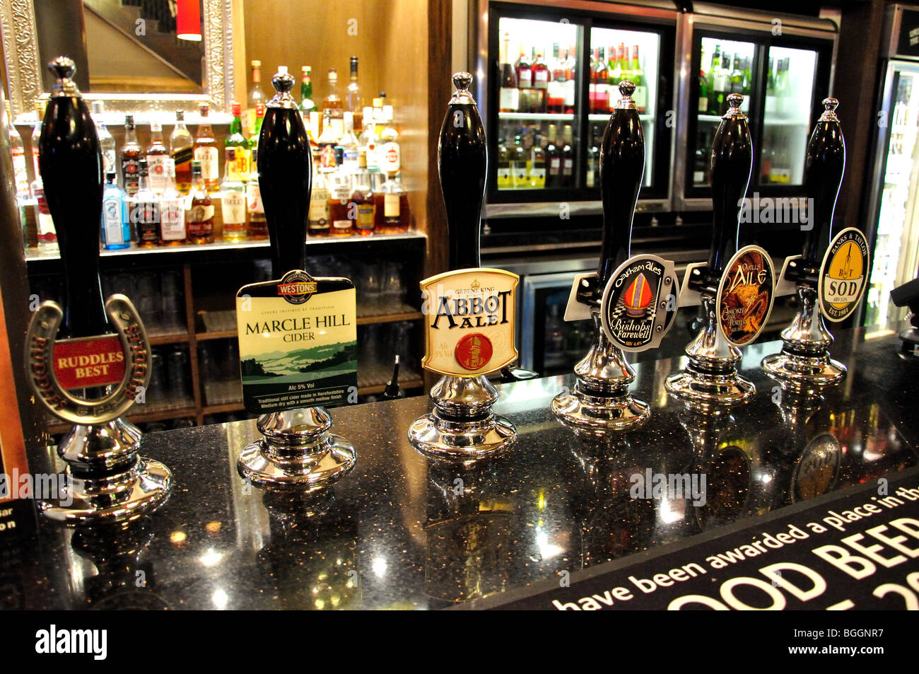 Beer pumps on bar, The King & Castle Pub, Thames Street, Windsor, Berkshire, England, United Kingdom Stock Photo