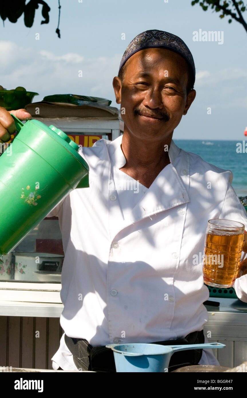 Food vendor on Kuta Beach, Bali, Indonesia Stock Photo