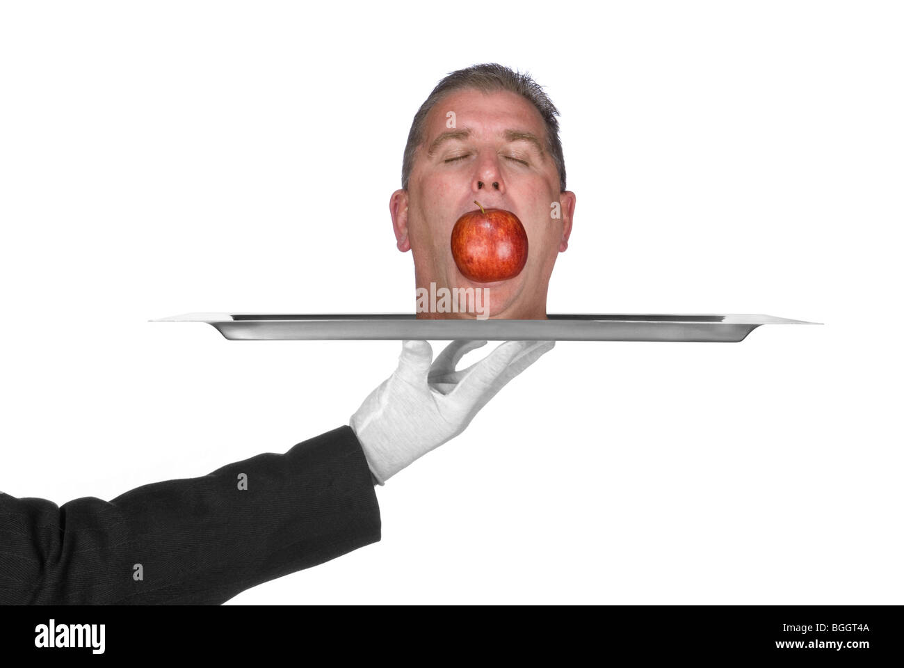 A head is served on a platter by a waiter. Image was shot for use as any trouble inference such as business and crime. Stock Photo