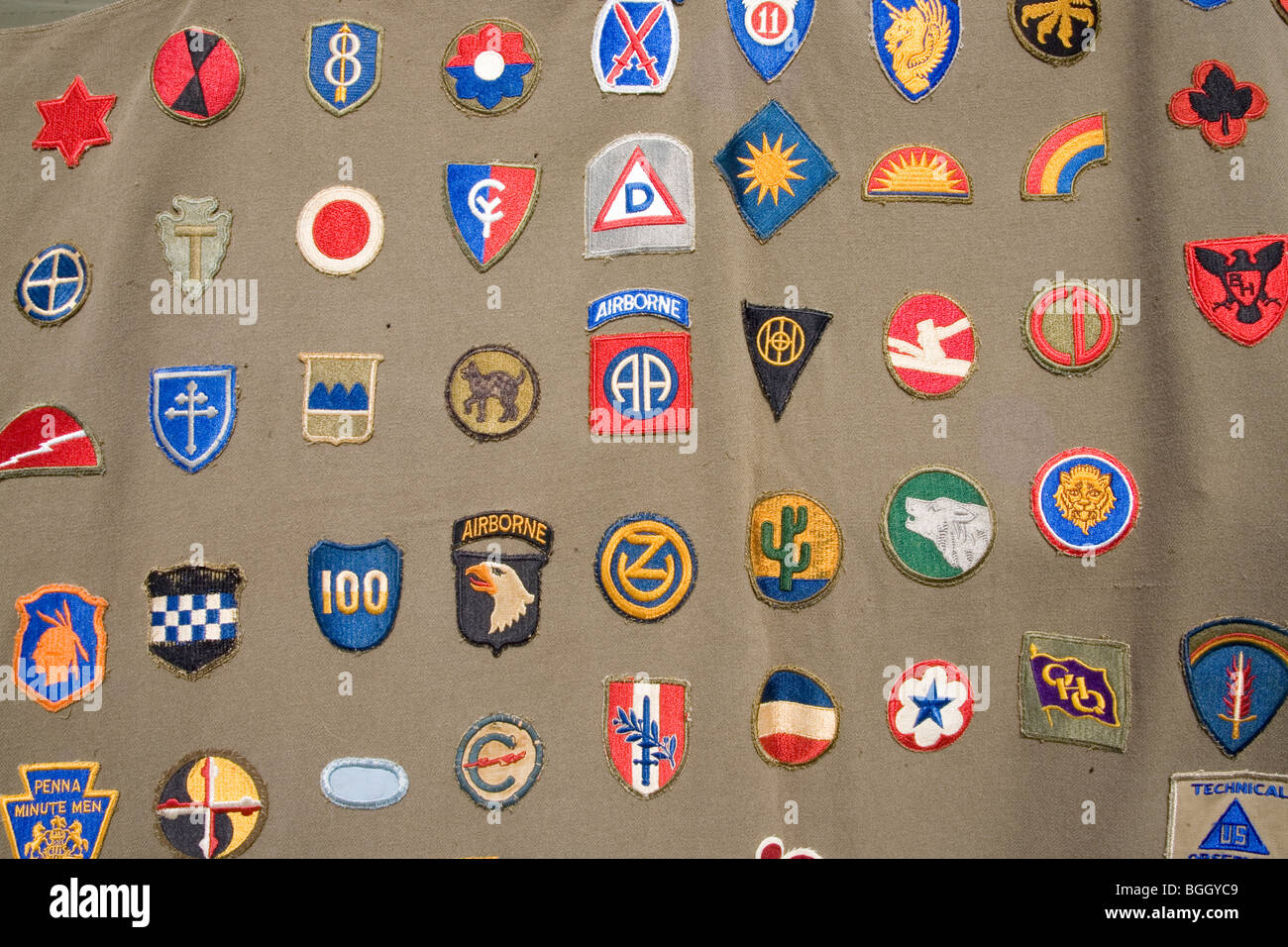 Detail of World War II army patches on side of tent at Mid-Atlantic Air Museum World War II Weekend and Reenactment Stock Photo