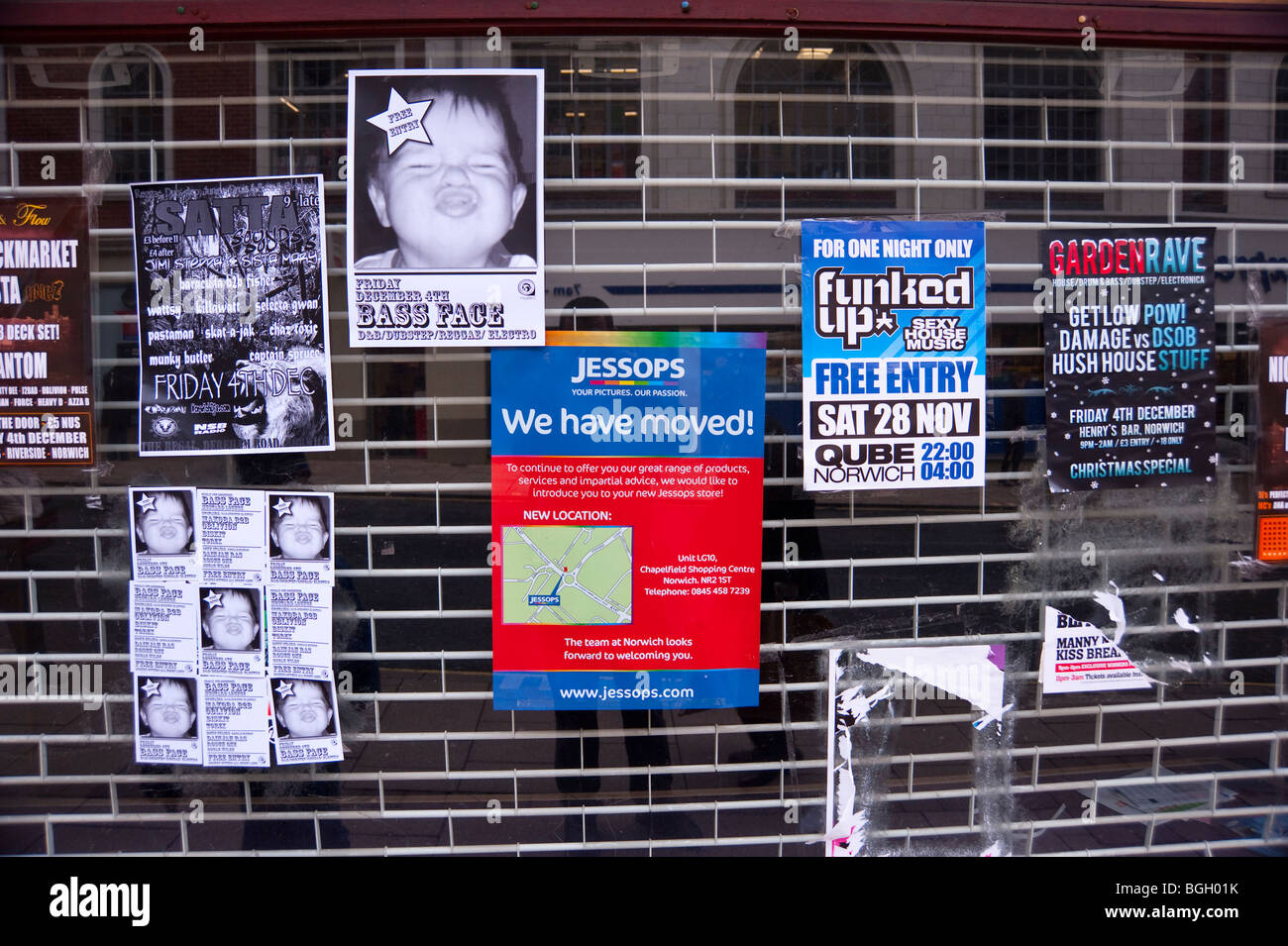 Fliers put up on a shop window in Norwich,Norfolk,UK Stock Photo