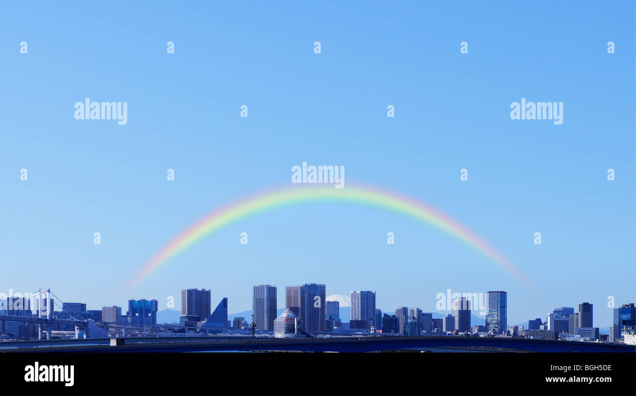 Rainbow over Tokyo skyline, Japan Stock Photo