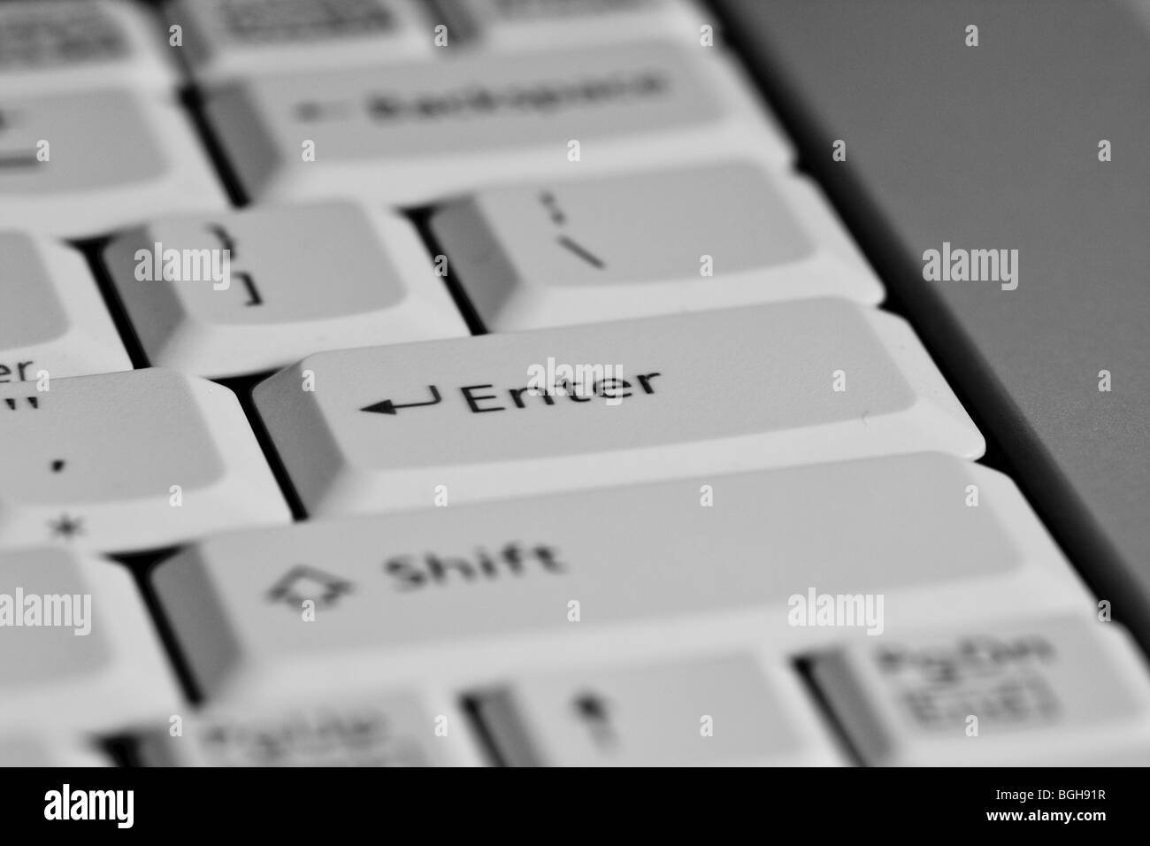 computer laptop white keyboard, close up of the enter key Stock Photo