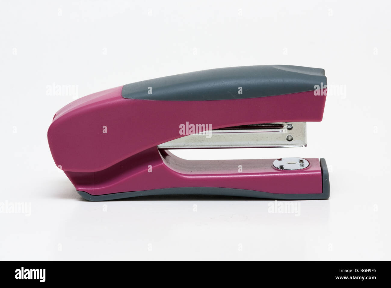 A purple stapler on white background Royalty Free Vector