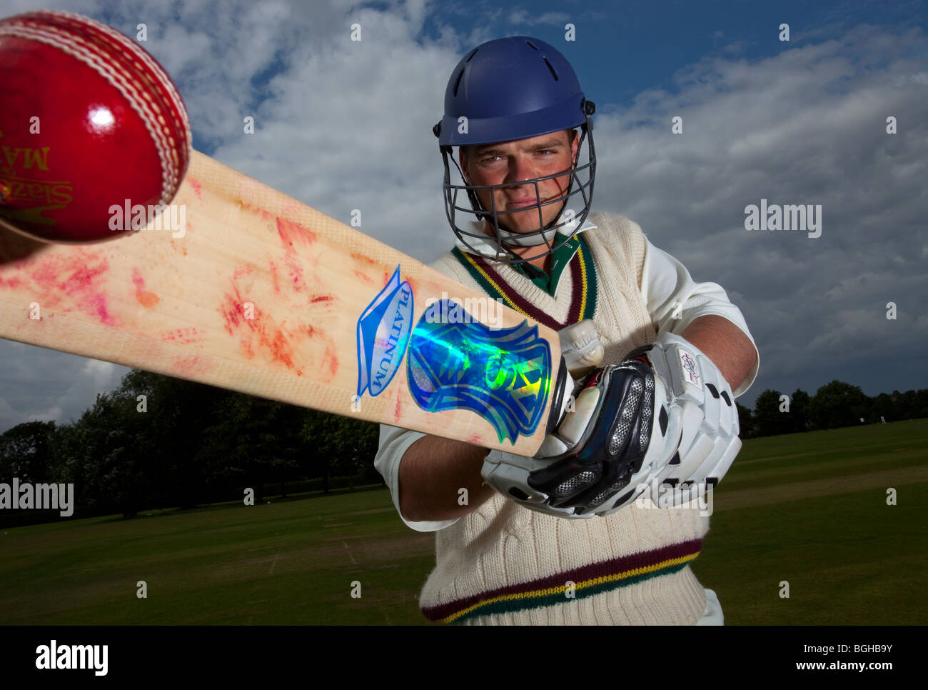 cricket player batsman ball bat Stock Photo