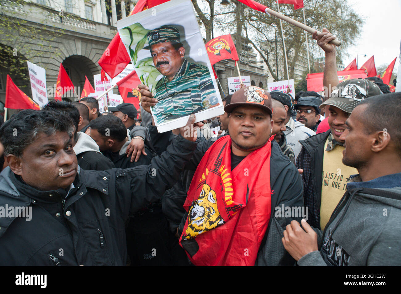 100,000+ Tamil march through London protests the killing of civilians and Tamil Tigers in Sri Lanka. Photo of Tamil Tiger leader Stock Photo