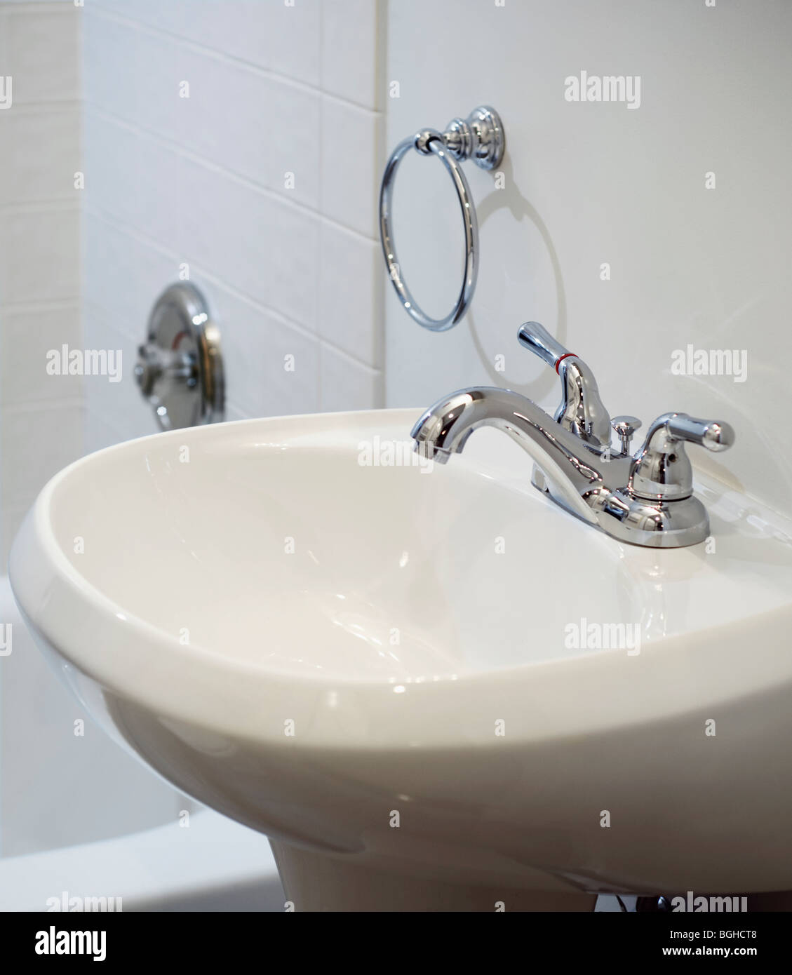 Small white pedestal sink Stock Photo Alamy
