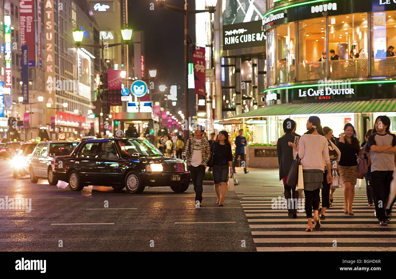 Street crossing. Ginza. Tokyo at night, Japan Stock Photo